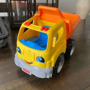 Fisher-Price Little People Dump Truck with Sounds from 2015
